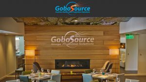 Metal gobo projection of GoboSource logo shows alterations to font and design. 