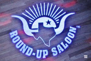 The Round-Up Saloon projects their logo with a custom gobo on the dance floor to promote social media sharing. 