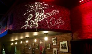 The Lighthouse Cafe projects a custom gobo behind their stage to promote social media sharing.