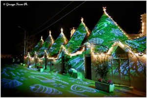 Stunning holiday light displays for public spaces include this Italian village along the Almalfi Coast illuminated with string lights and Christmas gobo projections. 
