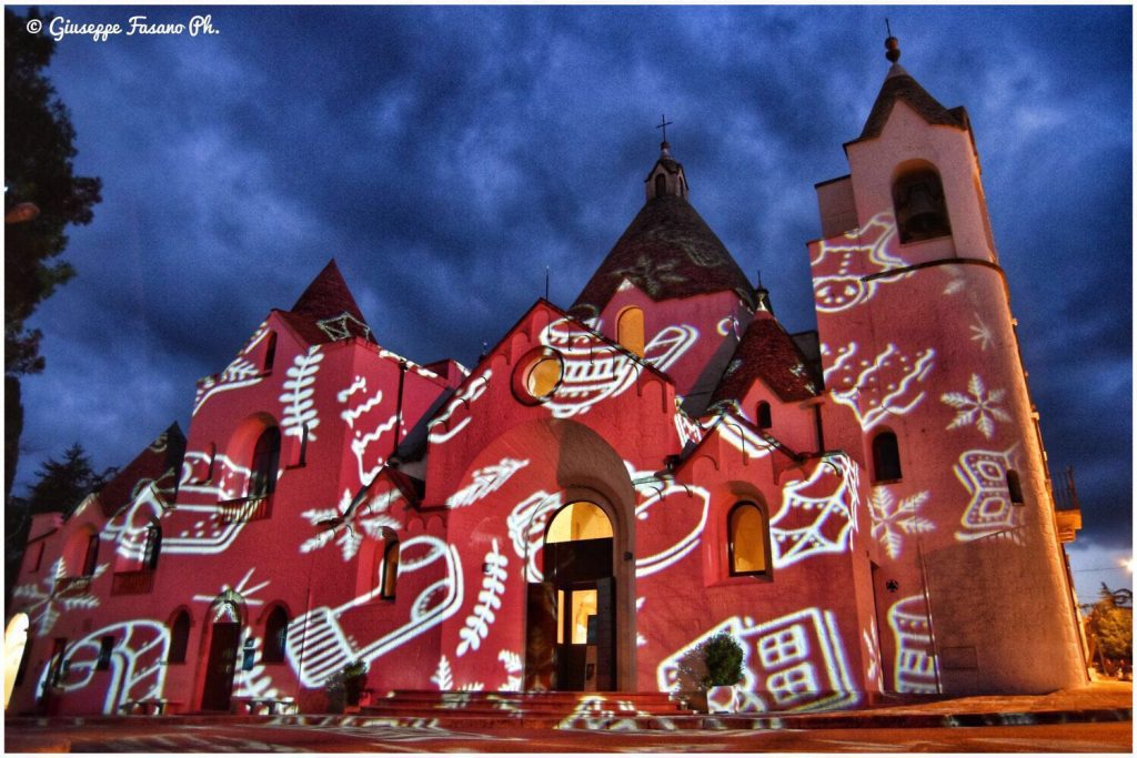 Holiday gobo projections decorate an historic building