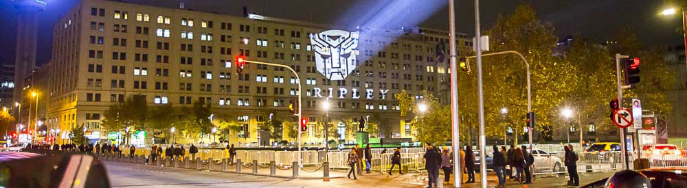 Picture of branded projections on Boston mall rooftop at night. using ECO Spot B150E's provided from GoboSource.